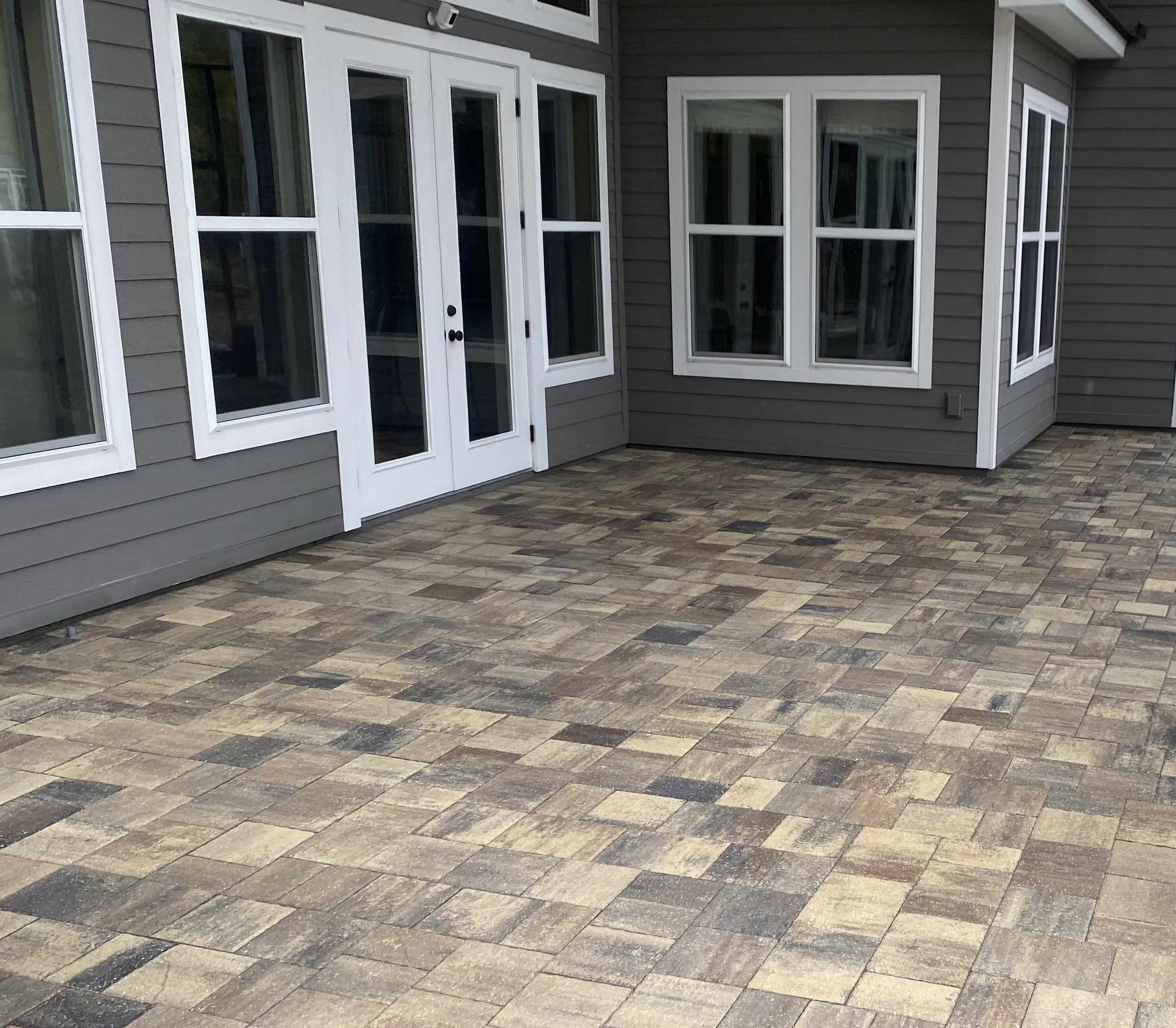Patio and pool deck pavers after sealing in SilverLeaf
